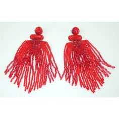 This is part of Chairish’s Costume Jewelry assortment.  Contemporary Deepa Gurnani red beaded chandelier earrings with post hardware. The standout ‘lipstick’ red shade is enhanced by iridescent beads that incorporate a hint of magenta. The effect is ‘bead’-dazzling!! The husband and wife team behind the Deepa Gurnani brand seek to promote the time honored tradition of Indian hand beading and embroidery with their beautiful designs.  Very good condition.  Each earring measures 4.25” long x 1.75” Large Beads Earrings For Party, Red Beaded Earrings For Party, Beaded Dangle Chandelier Earrings For Party, Large Beads Party Earrings, Party Earrings With Large Beads, Party Large Beaded Dangle Earrings, Party Dangle Earrings With Large Beads, Red Drop Beaded Earrings For Celebration, Red Beaded Fringe Dangle Earrings