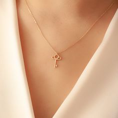 "14k 18k Solid Gold Key Diamond Necklace, Diamond Key Necklace, Dainty Gold Key Lock Necklace, Diamond Key Pendant Necklace Gift for Her Material: Solid Gold (real gold, not gold plated or gold filled material) Karat: 14K (585) , 18K (750) - Optional Pendant Width: 1.00 cm Pendant Height: 1.60 cm Available Gold Color: Yellow gold, rose gold and white gold (optional) Diamond weight: 0.01 ct Diamond color: G-H Color Diamond clarity: SI You can customize your chain length and thickness. Chain Lengt Elegant Yellow Gold Charm Necklace For Mother's Day, Elegant Locket Charm Necklace As Gift, Formal 14k Gold Clavicle Chain Charm Necklaces, 14k Gold Necklaces For Formal Mother's Day, 14k Gold Necklaces For Mother's Day Formal Occasions, Elegant 14k Gold Charm Necklace For Gift, 14k Gold Necklaces For Formal Occasions On Mother's Day, 14k Gold Necklaces For Formal Occasions And Mother's Day, Elegant Hallmarked Necklaces For Mother's Day