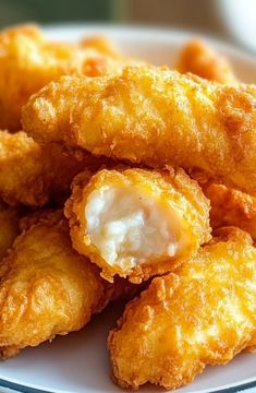 some fried food is on a white plate