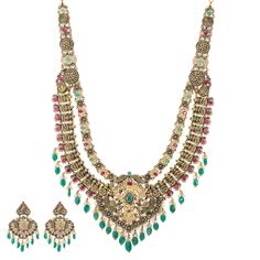 Enhance your cultural or traditional wear with Virani Jewelers' 22k antique gold and gemstone jewelry set. This opulent antique temple jewelry set, a masterpiece of Indian jewelry, exudes timeless elegance. The intricate detailing, featuring an engraved depiction of an peacocks and deities, imparts an aura of sacred charm. Crafted in radiant 22k antique gold, each piece of antique gold jewelry included in the set is a testament to artistry and precision. Wearing this jeweled gold necklace and ea Traditional Gold Sets With Peacock Design, Antique Gold Chandbali Temple Necklace, Temple Jewelry Sets With Intricate Design For Diwali, Ornate Temple Necklace With Meenakari For Puja, Ornate Meenakari Temple Necklace For Puja, Ceremonial Meenakari Temple Jewelry Sets, Festive Bollywood Jewelry Sets With Peacock Design, Multicolor Temple Jewelry Sets With Intricate Design, Bollywood Style Jewelry With Peacock Design For Rituals