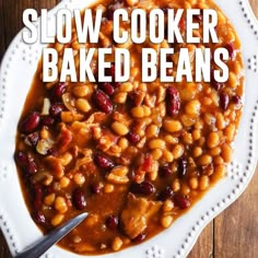 slow cooker baked beans in a white bowl with text overlay reading slow cooker baked beans