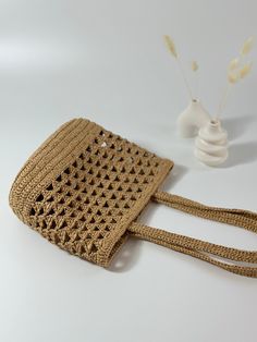 🌸Meet our wicker knitted bags made of natural raffia. This handmade Tote Bag is very stylish, lightweight and the perfect summer accessory. Our stylish shoulder bag in natural color will look great with any summer outfit. This unique design makes it a unique bag. Elegant design, perfect for daily use, shopping or going out. 🌸Every detail of this Tote Bag has been produced with the highest level of craftsmanship and carefully considered. Its sufficiently large internal volume is large enough to Crochet Wicker Bag, Summer Beige Crochet Bag Made Of Yarn, Eco-friendly Rectangular Open Weave Straw Bag, Beige Braided Crochet Bag, Summer Handwoven Crochet Bag Made Of Yarn, Brown Braided Crochet Bag For Beach, Brown Braided Crochet Beach Bag, Brown Braided Crochet Shoulder Bag, Lightweight Beige Crochet Bag Rectangular