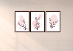 three framed art prints hanging on the wall