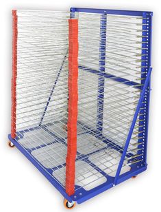 a large metal rack with two red and one blue racks on each side, in front of a white background