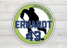 a sticker with the words erhardt 42 and a hockey player on it