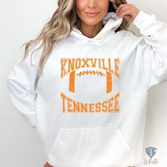 This unisex heavy blend hooded sweatshirt is relaxation itself. Made with a thick blend of cotton and polyester, it feels plush, soft and warm, a perfect choice for any cold gameday.  #Vols #GBO #Tennessee #VFL #GoVols #UTK #RockyTop #Knoxville #UT 𝗛𝗢𝗪 𝗧𝗢 𝗢𝗥𝗗𝗘𝗥 -Please Make Sure You have read full description and have viewed all images for Sizing and Color Info.  -Choose Size and Style in the Dropdown Menu before adding to your cart. -Please Check that All Correct Shipping Info is entered before Checking Out. 𝗦𝗜𝗭𝗜𝗡𝗚 𝗖𝗛𝗔𝗥𝗧 Our shirts are UNISEX sizing (looser fit for women). Please see Size Chart image for measurements. 𝗛𝗢𝗪 𝗜𝗧'𝗦 𝗠𝗔𝗗𝗘 .: 50% cotton, 50% polyester (fiber content may vary for different colors) .: Medium-heavy fabric (8.0 oz/yd² (271 g/m .: Classi White Fleece Hoodie For Fan Gear, White Cotton Hoodie For Game Day, White Cotton Hoodie For Fan Gear, White Hoodie With Team Name For Fall, White Hoodie For Sports Events In Fall, White Hoodie With Ribbed Cuffs For Game Day, White Long Sleeve Hoodie For Football Season, White Hoodie Sweatshirt For Fan Gear, White Hoodie Sweatshirt For Fans