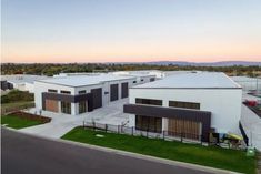 this is an aerial view of a modern home in australia, with lots of windows