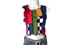 One of a kind color block pop art sweater top, size Small. ❤️DESCRIPTION:  One of a kind, 80% recycled patchwork knit top. Brlliant color block top in a color palette of lime green, orange, yellow, blue, pink, purple, and black & white. Both the front and the back have the same motif. Midriff-baring cropped length. Versatile and so easy to wear. Pair it with distressed jeans, joggers, a skirt - whatever motivates you, for a one of a kind look. And feel good about choosing slow fashion with recyc Retro Knit Color Block Tops, Retro Color Block Knit Tops, Casual Patchwork Sleeveless Sweater Vest, Y2k Patchwork Tops For Fall, Casual Multicolor Patchwork Tops, Y2k Multicolor Tops For Fall, Playful Patchwork Crew Neck Top, Trendy Sleeveless Patchwork Tops, Colorful Patchwork Top For Fall