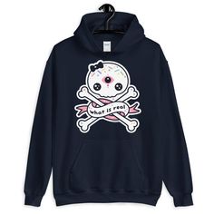 A pastel goth hoodie with kawaii skull.This hooded sweatshirt looks great on both men and women.Perfect for people who love looking cute and questioning the true nature of reality.Runs large for women.Fits men true to size.Lined hoodDouble stitched throughoutSoftHas a pocketRuns large for womenReduced pillingPlus sizes available up to 5XOriginal artwork not available in storesSizing tip: Take a shirt that fits you the way you like, lay it flat and measure the width (from under one arm to under t Kawaii Streetwear Hoodie With Letter Print, Casual Hooded Sweatshirt With Skull Print, Fun Cotton Hooded Hoodie, Fun Cotton Hoodie, Casual Skull Print Hoodie, Kawaii Graphic Print Hoodie For Fall, Fall Kawaii Hoodie With Graphic Print, Casual Cotton Hoodie With Skull Print, Fun Graphic Print Hoodie For Streetwear