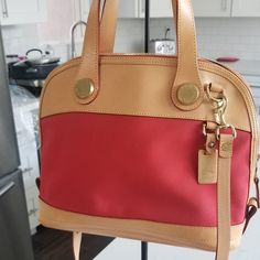 Vintage Classic Dooney And Bourke Bag In Great Used Condition. A Few Scuffs On The Leather As Shown In Pictures. Interior In Great Vintage Condition. Shoulder Strap 40 Inches And Never Used. Please Feel Free To Ask Questions. Offers Welcome. Classic Red Bags With Leather Trim, Designer Red Bags With Leather Trim, Elegant Red Bags With Leather Trim, Red Shopping Bag With Leather Trim, Red Leather Trim Shopping Bag, Red Leather Trim Bag For Shopping, Red Leather Trim Satchel Bag, Vintage Dooney And Bourke, Bags Vintage