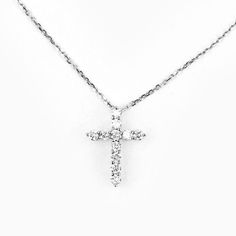 The cross is a symbol of God’s unfailing love for you. Wear this necklace as your prayer, “Jesus lend me your heart so that I may LOVE like You.” Amen. Diamond Cross 14K Gold Pendant 18" 14K Gold chain + 2" extension 14 karat white or yellow gold, 11 diamonds (0.25 carat) The Heart of Jesus Necklace comes in a box with an inspirational card Crucifix Necklace With Vvs Clarity As Gift, Gift Crucifix Necklace With Vvs Clarity, Gift Crucifix Necklace Vvs Clarity, Vvs Clarity Crucifix Necklace As Gift, Diamond White Cross Pendant Necklace, Cross-shaped Diamond Necklace With Single Cut Diamonds, Cross-shaped Diamond Necklace With Accents, Cross-shaped Diamond Necklace For Gift, Luxury Diamond-accented Cross Pendant Necklace