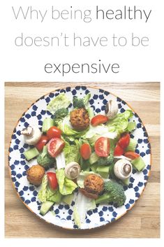 a plate filled with vegetables and meat on top of a wooden table next to the words, why being healthy doesn't have to be expensive