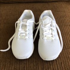 White Adidas Tennis Shoes Size Kids 4.5 Almost Brand New Only Worn A Couple Of Times White Running Shoes With Elastic Laces And Round Toe, White Running Shoes With Elastic Laces, Synthetic Lace-up Running Shoes For School, White Cushioned Sneakers For School, White Low-top Running Shoes For School, Casual White Running Shoes For School, White Lace-up Running Shoes For School, Adidas Tennis Shoes, Adidas Tennis