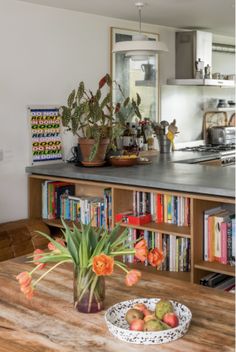 the kitchen is clean and ready to be used as a dining room or living room