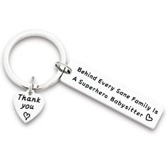 a keychain with a heart shaped tag on it that says, thank you