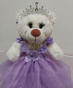 Quinceaner Teddy Bear with eyelashes  Embroidery of Mis 15 Años on the paw or without embroidery Lilac dress  20" height with the stand (cone) Crown and earrings (silver or gold) Dress is designed as shown in the images but can be made in different colors Lilac Color Dress, Embroidery Lilac, Quince Purple, Quinceanera Teddy Bear, Gold Quince Dress, Birthday Debut, Vestido Color Lila, Purple Teddy Bear, Purple Quince