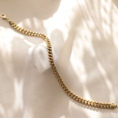 14K Gold 5.3 mm Curb Chain Bracelet, Cuban Link Chain Bracelet, Stacking Retro Chain Bracelet Gift for Womam/Men Unisex Everyday Jewelry Materials & Specifications : Chain Width : 5.3 mm (0.20in) Bracelet Empty Inside Chain Lengths : 16 cm (6.3 in) 17 cm (6.7 in) 18 cm (7 in) 19 cm (7.5 in) 20 cm (7.9 in) MODERN CLASSIC - Add luxurious style to a basic look with this 14k Gold Staple Oval Link Chain.Strong and comfortable and gives a modern edge to both casual and dressy outfits. Wear it solo Herringbone Braid, Empty Inside, Jewelry Product Shots, Mens Valentines Gifts, Jewelry Materials, Curb Chain Bracelet, Bracelet Stacking, Product Shots, Link Chain Bracelet