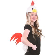 a woman in a chicken costume poses for the camera with her hands on her hips