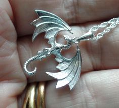 Overseas Buyers, can you please include a Mobile Phone number for the Courier for tracking updates. Follow me on Instagram to see my latest listings A smaller Sterling Silver Dragon Pendant, on a Sterling Silver Chain.  Measures 2.93cm by 2.65cm to the top of the bale. Shipping will be combined to reduce postage costs and includes a Gift Box made in England using 100% FSC Accredited and 100% Recyclable Board and Paper.  Checkout by 8.30am ensures same day dispatch. Item will be dispatched by Roy Silver Dragon Necklace, Dragon Necklace, Silver Dragon, Dragon Pendant, Sterling Silver Chain, Sterling Silver Chains, Pendant Necklaces, Phone Number, Silver Chain