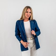 Discover the perfect blend of casual and polished with our chic structured denim blazer. Designed for the fashion-forward woman, this versatile denim jacket offers a sophisticated silhouette with notched lapels and a contemporary tailored fit. It's an ideal piece for those seeking a casual sophisticated denim blazer that transitions effortlessly from day to night. Denim Blazer, Business Meeting, Womens Blazers, Premium Denim, Modern Fit, Formal Occasion, A Business, Fashion Forward, Denim Jacket