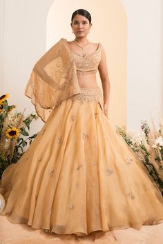 Yellow can can attached pre-drape lehenga saree in a woven base with dori embroidered floral motifs embellished by sequins. Comes with padded floral swirl embroidered blouse embellished by bead tassels. - Aza Fashions Fitted Draped Wedding Lehenga, Fitted Lehenga With Dupatta Draped, Fitted Draped Lehenga With Dupatta, Wedding Draped Dupatta, Festive Pre-draped Lehenga For Reception, Fitted Organza Pre-draped Saree, Pre-draped Lehenga For Wedding, Draped Fitted Choli For Wedding, Draped Tissue Silk Lehenga For Reception