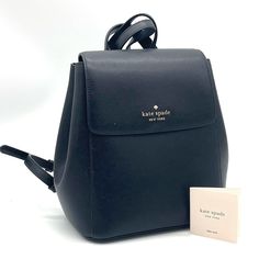 Brand New With Tag Kate Spade New York Madison Flap Leather Medium Backpack Details Color: Black 9.5"H X 10”W X 5.5"D Saffiano Leather Metal Pinmount Logo Two Way Spade Jacquard Lining Interior: Front Slip & Back Zip Pockets Flap Magnetic Dust Bag Not Included Style # Kc428 Luxury Elegant Kate Spade Backpack, Kate Spade Backpack With Adjustable Strap For Errands, Chic Everyday Backpack With Dust Bag, Kate Spade Satchel Backpack With Adjustable Strap, Kate Spade Backpack With Detachable Strap For Errands, Black Backpack With Dust Bag For On-the-go, Kate Spade Black Backpack With Removable Pouch, Kate Spade Black Backpack With Detachable Strap, Kate Spade Black Backpack For Errands