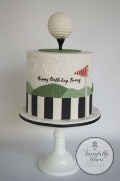 a birthday cake with a golf ball on top