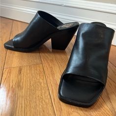 Vince Camuto Sempela 3.25” High Heel Mules In Black Leather With Square Toe, Size 6, Tts But Fits Wide. Great Shoe To Dress Up Or Down And Can Throw On With Anything For Spring, Summer And Fall. Brand New, Never Worn (No Box) Sleek Black Slip-on Mules, Sleek Synthetic Mules With Block Heel, Sleek Black Slip-on Heels, Synthetic Mules With Stacked Heel For Work, Leather Fitted Mules With Heel Loop, Casual Black Heels With Heel Loop, Sleek Slip-on Heels For Night Out, Faux Leather Block Heel Sandals For Fall, Casual Black Mules With Padded Heel