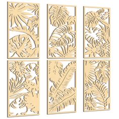 four laser cut panels with tropical plants and leaves on them, each panel has a different size