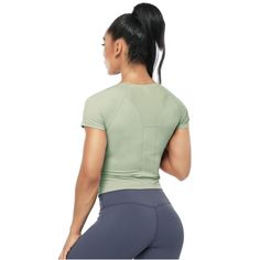 Elevate your workout wardrobe with the WhizMax Workout Crop Top, designed specifically for women who love to stay active. This short-sleeve sage green top is perfect for a variety of activities, from running and yoga to gym sessions and other athletic exercises.

- Color: Sage Green
- Size: XL
- Material: High-quality, non-see-through fabric with ultra-high elasticity
- Gender: Female
- Age Group: Adult

The crop top features a soft and comfortable fabric that is both durable and stretchy, ensur Moisture-wicking Short Sleeve T-shirt, Athleisure Cropped T-shirt For Workout With Short Sleeves, Fitted Short Sleeve Sports T-shirt, Sporty Stretch Cropped T-shirt With Short Sleeves, Fitted Cropped T-shirt For Workout, Fitted Short Sleeve T-shirt For Yoga, Green Moisture-wicking High Stretch Tops, High Stretch Short Sleeve Gym T-shirt, Compression Short Sleeve Gym T-shirt