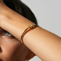 This Iconic Moving X Bangle with Diamond Pavé invites you to uncover your inner treasures through its bold and iconic design, making a definitive statement of discovery and self-expression. Accent diamonds: 0.10+ ctw, VS2+/F+ Setting: Prongs setting Yellow Gold Promise Bangle Jewelry, Yellow Gold Promise Bangle, Promise Yellow Gold Bangle Jewelry, Luxury Round Promise Bracelet, Timeless Bracelet With Spring Ring Clasp, Timeless Bracelets With Spring Ring Clasp, Everyday Luxury Tarnish Resistant Yellow Gold Bangle, Polished Rose Gold Bracelet, White Gold Tarnish Resistant Bangle