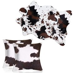 two brown and white pillows sitting next to each other