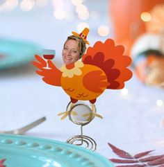 a woman with a turkey head on top of a table