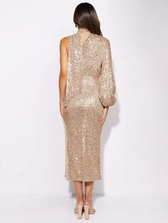 Elevate your evening wardrobe with this stunning Layton Sequin One-Shoulder Midi Dress. Delicately crafted from a luxe blend of sequin and crepe fabric, this contemporary silhouette features an of-the-moment asymmetric one-shoulder halter neckline and cascading ruching, allowing you to make a sophisticatedly chic style statement. Size Guide: Model is 5’7” tall, and has a 33.4” bust, 26.5” waist, & 34.6” hips. She is wearing a S / US 4 / AU 8. This dress is true to size. Material: Self & Lining – Off-shoulder Midi Dress For Fall Party, Fall Off-shoulder Midi Dress For Party, Fall Party Off-shoulder Midi Dress, One-shoulder Midi Dress For Evening, Gold Midi Dress For Evening Parties, Gold Midi Dress For Evening Party Season, Sequin Midi Length Cocktail Dress, Cocktail Midi Evening Dress With Sequins, One Shoulder Evening Midi Dress