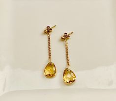 Delicate, feminine and so gorgeous! This is an 18k Gold Filled Earrings featuring a beautiful polished Citrine gemstone. You can see how clear is this stone’s cut. Amazing! Citrine is a great gem to wear to increase motivation! You will love how it will match a lot of your outfits! Product Details: . Size: 2” . Material: 18k Gold Filled Elegant Formal Citrine Earrings, Elegant Teardrop Citrine Jewelry, Elegant Drop Citrine Earrings, Elegant Citrine Earrings For Wedding, Elegant Citrine Faceted Earrings, Elegant Faceted Citrine Earrings, Formal Teardrop Citrine Earrings, Elegant Citrine Drop Earrings, Elegant Citrine Teardrop Earrings