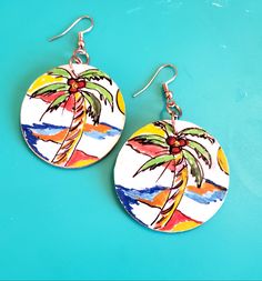 "\"Palm Tree\" EARRINGS HAND PAINTED Original artwork of the artist - My artist designed earrings are delicately crafted where no two pair are ever the same. They first premiered to a large audience of some very \"fashion savvy shoppers\" at The Southern Women's Show, where they were a huge hit. I had so much fun explaining the process of how I create my earrings. Everyone was fascinated and amazed at their extreme \"feather weight!\" No more sore ears from heavy earrings! Why? - because they ar Artistic Adjustable Jewelry For Beach, Multicolor Hand Painted Earrings For Beach, Artsy Summer Earrings With Ear Wire, Artistic Handmade Beach Jewelry, Adjustable Artsy Earrings For Summer, Artistic Drop Earrings For Summer, Artistic Multicolor Beach Jewelry, Artsy Earrings For Summer Beach Occasions, Artsy Earrings For Summer Beach Outings