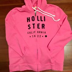 Cozy Pink Hollister Hoodie, Juniors Large. Zip Front Closure With Front Pockets. Dark Navy Hollister Logo On Front. Perfect For The Chilly Weather! Brand New With Tags!! Pink Hoodie For Leisure In Fall, Pink Leisure Hoodie For Fall, Casual Pink Sweater With Drawstring Hood, Casual Pink Fleece Sweater, Pink Hooded Casual Sweater, Casual Pink Hooded Sweater, Pink Casual Cozy Fit Sweatshirt, Pink Cozy Fit Casual Sweatshirt, Comfortable Pink Winter Tops