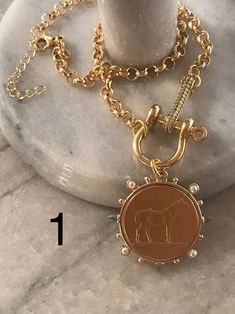 Bronze Medallion Necklaces With Charms, Elegant Medallion Pendant Necklace With Charms, Elegant Tarnish-resistant Bronze Necklace, Elegant Horse Design Necklace As Gift, Elegant Necklace With Horse Design As A Gift, Elegant Bronze Necklaces With Charms, Elegant Bronze Jewelry With Charms, Elegant Round Medallion Necklace With Charms, Elegant Bronze Coin Jewelry