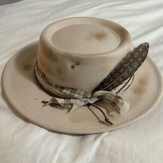 One Of A Kind Hat With Lv Feather. Never Worn. Casual Top Hat With Flat Brim For Fall, Casual Flat Brim Top Hat For Fall, Casual Wide Brim Top Hat For Fall, Adjustable Vintage Felt Hat For Fall, Vintage Top Hat With Short Brim For Fall, Vintage Short Brim Top Hat For Fall, Vintage Fedora Top Hat For Fall, Vintage Brimmed Fedora For Fall, Casual Boater Hat With Short Brim For Fall