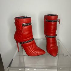 These Boots Are Red Hot!!! Super Sexy!! In Excellent Shape-Look Almost New!! Look Closely At The Toe And Heel Photos. There Is Slight Scuffing. Heel Height Is 4.5 Inches S23 Luxury Red Heeled Boots For Party, Designer Red Party Boots, Luxury Red Boots For Party, Red Glamorous Evening Boots, Glamorous Red Evening Boots, Red Ankle Boot Heels For Night Out, Luxury Heeled Boots With Red Sole For Party, Red Ankle Boots For Night Out, Luxury Party Heeled Boots With Red Sole