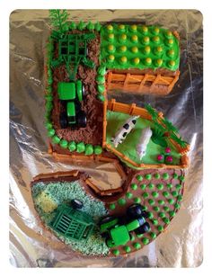 a cake made to look like a farm scene