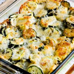 a casserole dish with zucchini and cheese