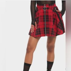 Black & Red Plaid O-Ring Suspender Gothic Skater Skirt. New Nwot. Let This Skater Skirt Skate Right Into Your Wardrobe With Its Cute Shape And Comfy Style. Printed All Over With Black And Red Plaid And Featuring Hip Pockets And Functional Front Zipper. 95% Polyester; 5% Spandex Wash Cold; Dry Low Imported Listed In Junior Sizes Model Wears Size Small; 16 1/2" Long Fall Rock Style Skirt For Cosplay, Emo Fitted Skirt For Concert, Emo Style Fitted Skirt For Concert, Rock Style Mini Skirt For Fall, Rock Style Red Mini Skirt, Red Rock Mini Skirt, Red Rock Style Mini Skirt, Edgy Mini Skirt For Winter, Red Punk Skirt For Fall