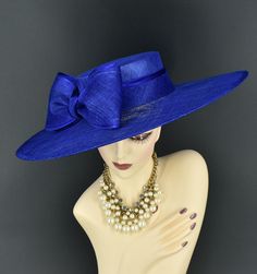 Note: The design of this hat, particularly the shallower crown, was crafted to create a unique aesthetic that suits some individuals perfectly. However, if you notice that the hat tends to slip, I would advise attaching an elastic strap to ensure a more secure and comfortable fit. ✿*.Key Features.*✿ This is a wide flat brim hat!! It's made of sinamay (3 layers ) and satin.  A nice sinamay bow is trimmed with satin ribbon too, very cool, one of my favorite hats! High quality. It's more beautiful in person! Great for Kentucky derby, weddings, church, Easter, Royal Ascot, horse races, cocktails, tea party, or any hat wearing occasion. Hat base size: From front to back: 19" (48cm) From left to right: 18.25" (46cm) Wide brim appr: 6" (15cm) Crown Depth: 3.5" (9cm) Hat girth: 21" (53.34cm). It f Easter Hat, Tee Party, Sinamay Fascinator, Royal Ascot Hats, Ascot Hats, Easter Hats, Hat Wedding, Church Hat, Flat Brim Hat