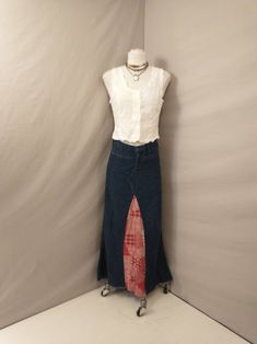 "Fabulous handmade from Landlubber jeans, denim skirt. Period 1970's , from the original owner (and seamstress) Made by Jill. Insert fabric is cotton, red bandana look, stamp on edge preserved. raw finish to denim lower edge. Looks to be made to sit low waisted - low rise in front but higher waisted in back. Many possibilities on what this could be paired up with. Four season. 100% Cotton, made in the USA, traditional denim fabric. Very good quality and construction. Very good condition, light w Casual Reworked Denim Skirt, Fitted Cotton Hippie Jeans, Fitted Denim Hippie Bottoms, Hippie Fitted Denim Bottoms, Casual Fitted Skirt Reworked, Festival Fitted Denim Bottoms, Fitted Medium Wash Bottoms For Festival, Fitted Denim Bottoms For Festival, Bohemian Cotton Denim Skirt For Festival