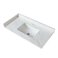 a white bathroom sink sitting under a faucet on top of a marble counter