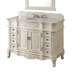 a white bathroom vanity with two sinks and drawers