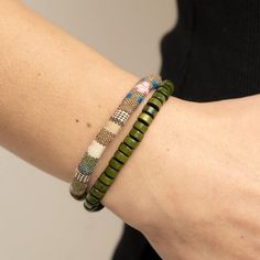 Pack Your Poncho Green A Strand Of Green Wooden Beads Joins A Colorful Textile Banded Cord Around The Wrist, Layering Into A Versatile And Seasonal Centerpiece Around The Wrist. Features An Adjustable Sliding Knot Closure. Sold As One Individual Uniquely Urban Unisex Bracelet. Earthy Multicolor Beaded Bracelets For Beach, Brown Beaded Bracelet For Summer, Summer Brown Beaded Bracelets, Bohemian Beige Beaded Bracelets For Summer, Bohemian Beige Beaded Bracelet For Summer, Everyday Bohemian Green Friendship Bracelets, Everyday Green Bohemian Friendship Bracelets, Green Bohemian Beaded Everyday Bracelets, Earthy Green Beaded Bracelets For Everyday