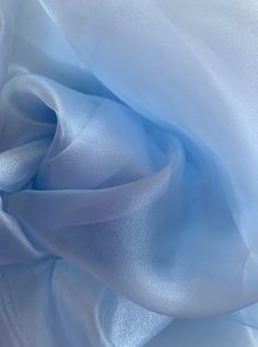 "light Blue sheer organza crystal organza in color light blue Description: 100% Polyester Crystal Organdy Width: 58/60\" inches Weight: 34 gm/sq m High quality sheer Crystal Organza Fabric perfect for Wedding Gowns, Apparel, Crafts and more organza is sold by the yard, orders more then 1 yard will be cut continuous  MORE COLORS ARE AVAILABLE ALL SALES ARE FINAL... Hi guys please make sure that before you make your purchase to remember that Per my Shop Policies and as noted in each listing: all sales are final. If you have any concerns or questions about a product- please address them *before* you make a purchase to ensure they meet your requirements. Contact us for assistance if you need any clarifications or help. thank you so much" Elegant Blue Tulle Fabric For Party, Blue Organza Tulle Fabric For Wedding, Blue Sheer Tulle Fabric For Party, Blue Fabric Texture, Organdy Fabric, Blue Sheers, Blue Tulle, Fabric Textures, Blue Texture