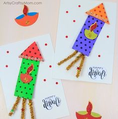 three handmade cards with different designs on them and one has an apple in the middle